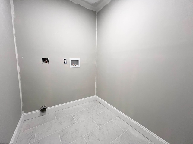 clothes washing area featuring marble finish floor, laundry area, hookup for a washing machine, and baseboards