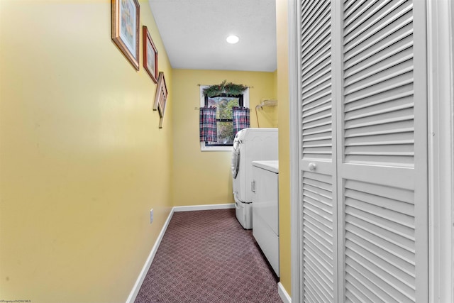 laundry area with carpet and washing machine and clothes dryer