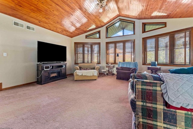 carpeted living room with high vaulted ceiling and wooden ceiling