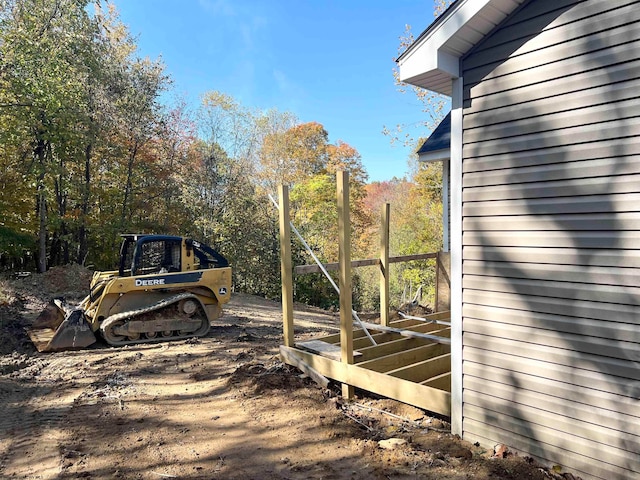 view of yard featuring a wooden deck