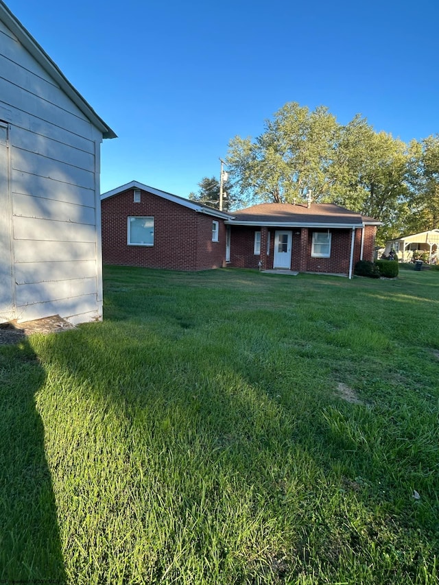 exterior space with a front yard