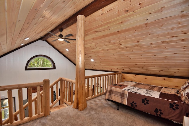 carpeted bedroom with wood walls, vaulted ceiling with beams, and wooden ceiling