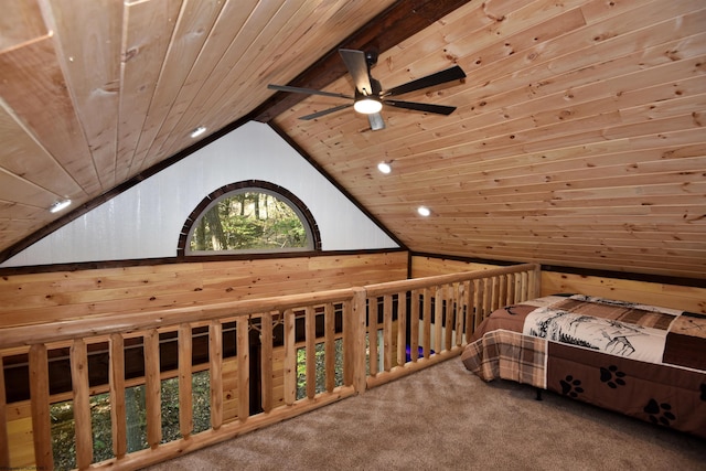 carpeted bedroom with lofted ceiling, wooden walls, and wooden ceiling