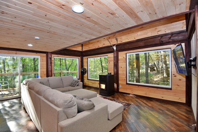 living room featuring wooden walls, wood ceiling, and dark hardwood / wood-style flooring