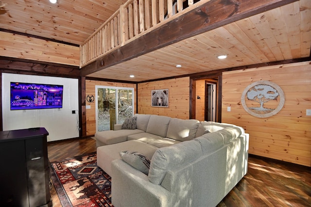 living room with dark wood-type flooring, wooden ceiling, and wooden walls