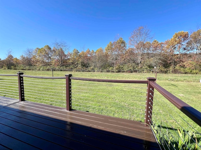 wooden deck with a yard