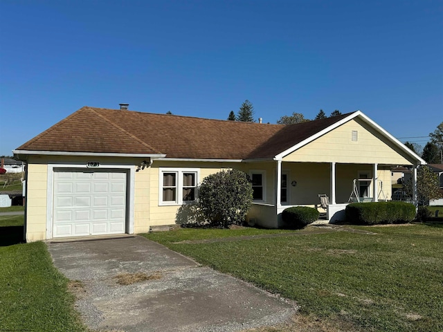 single story home with a front yard, covered porch, and a garage