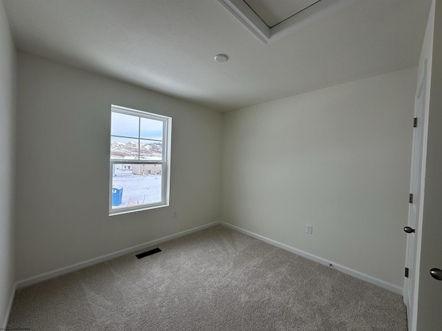 view of carpeted spare room