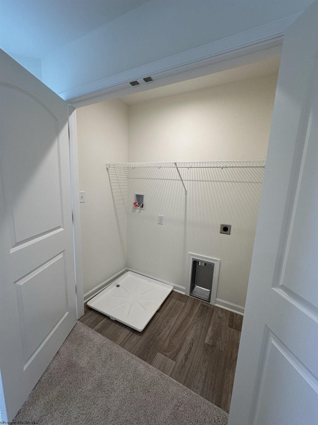 laundry room with washer hookup, electric dryer hookup, and dark hardwood / wood-style flooring