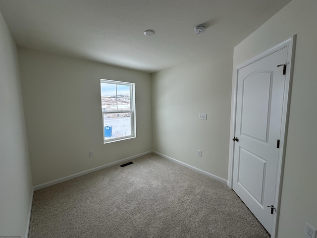 view of carpeted empty room