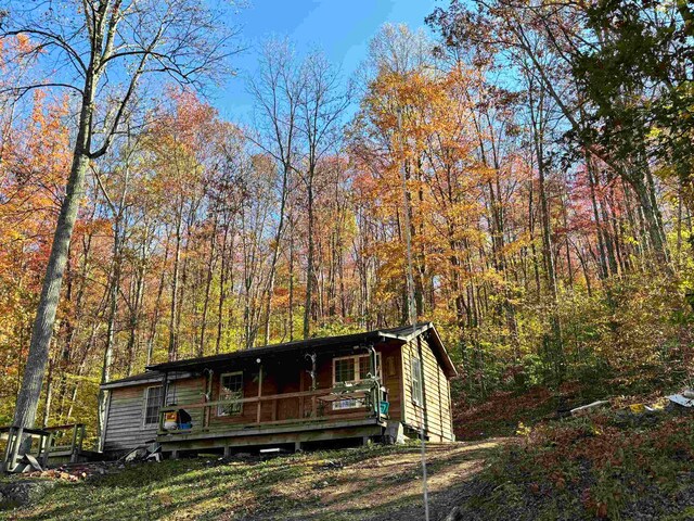 view of front of home with a wooden deck