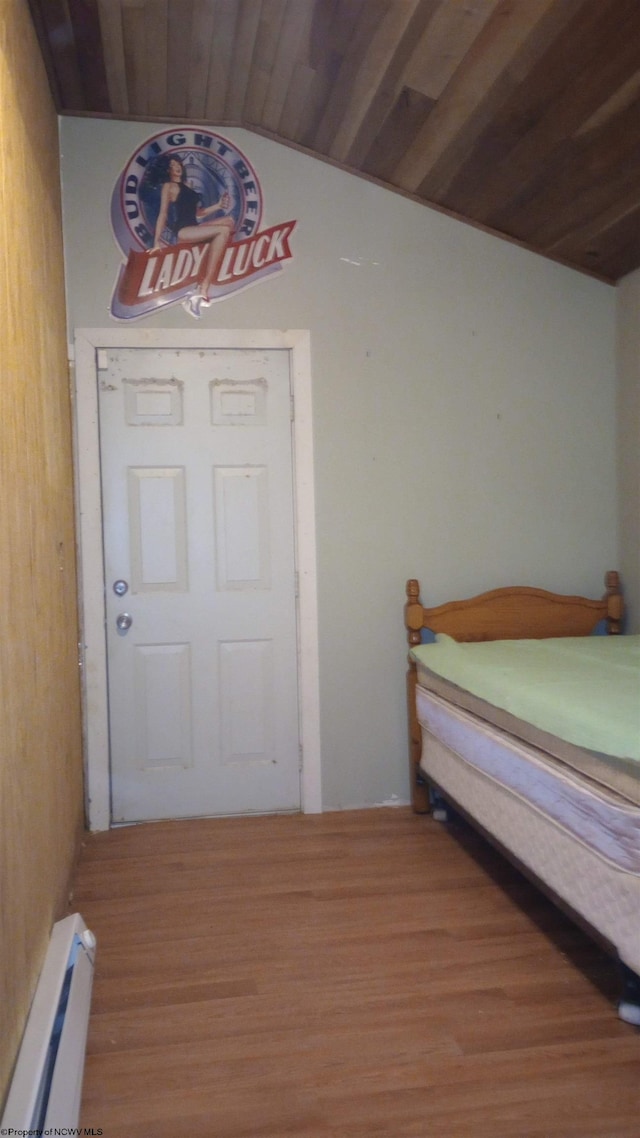 bedroom featuring a baseboard radiator, light wood-type flooring, lofted ceiling, and wooden ceiling