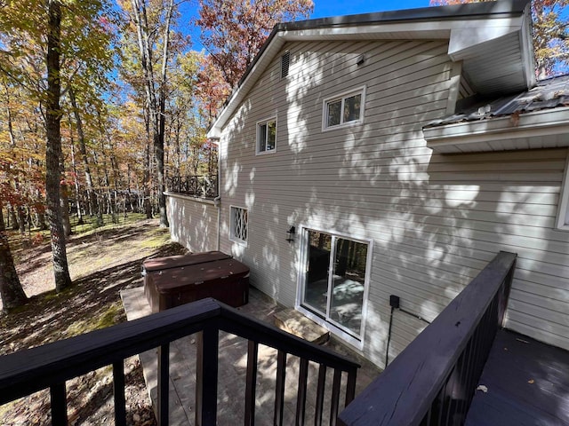 view of side of property with a deck