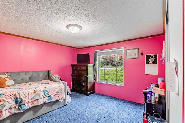 bedroom featuring crown molding, a textured ceiling, and carpet
