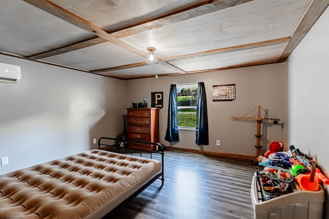 bedroom featuring baseboards, a wall unit AC, and wood finished floors