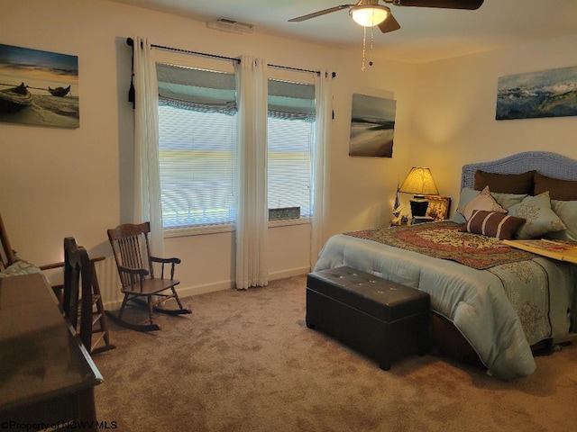 bedroom featuring ceiling fan and light colored carpet