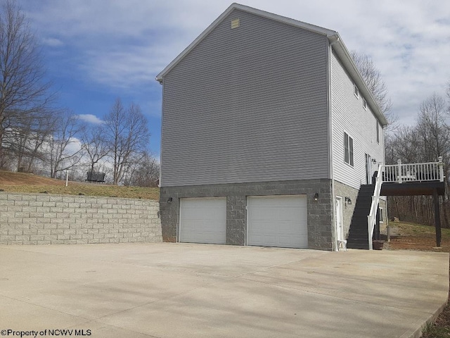 view of home's exterior with a garage