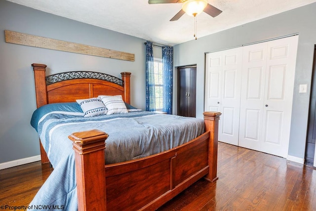 bedroom with dark hardwood / wood-style floors and ceiling fan