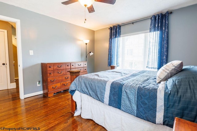 bedroom with wood-type flooring and ceiling fan