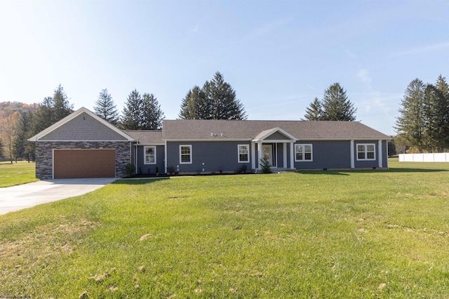 single story home featuring a front yard and a garage