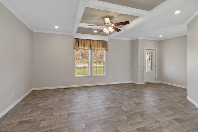 empty room with ceiling fan and ornamental molding