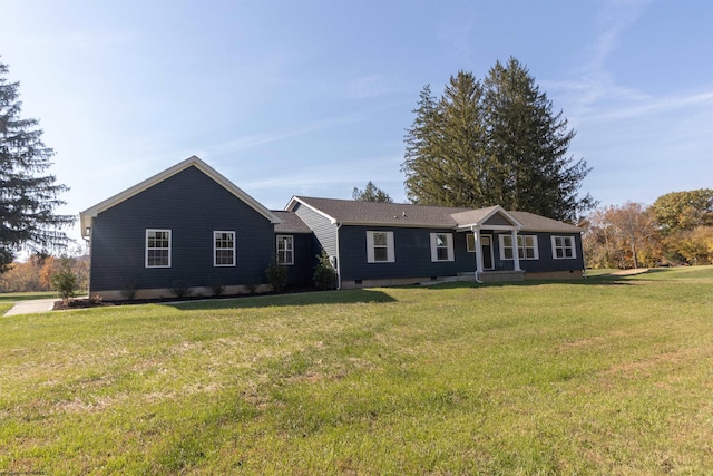 single story home featuring a front lawn