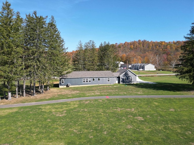 view of front of home with a front lawn