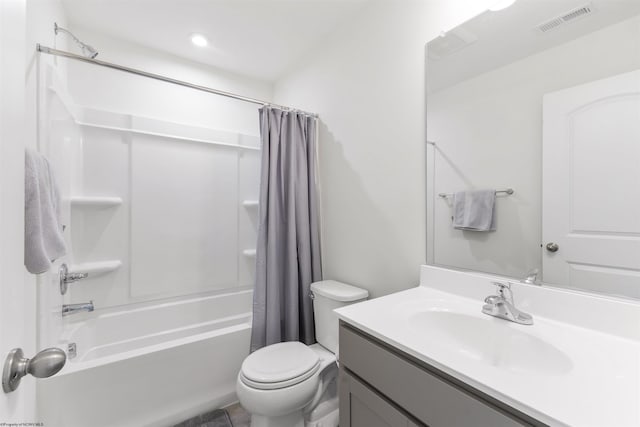 full bathroom with vanity, toilet, and shower / tub combo