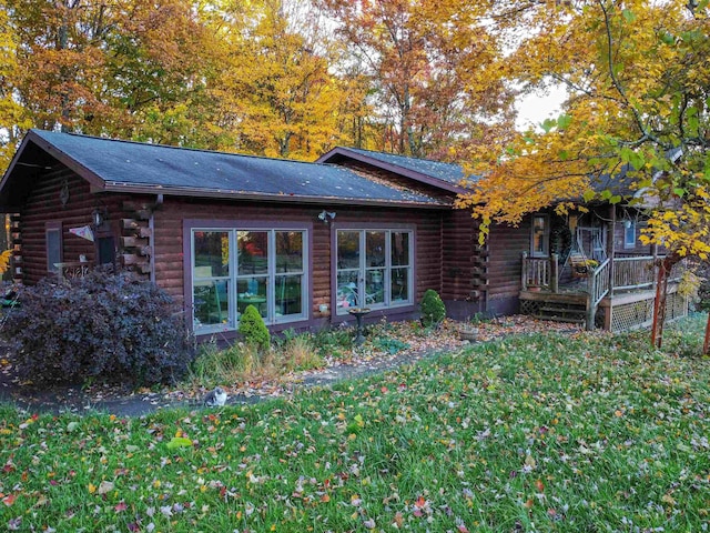 view of property exterior featuring a yard