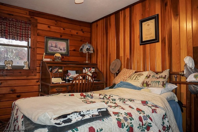 bedroom with wood walls