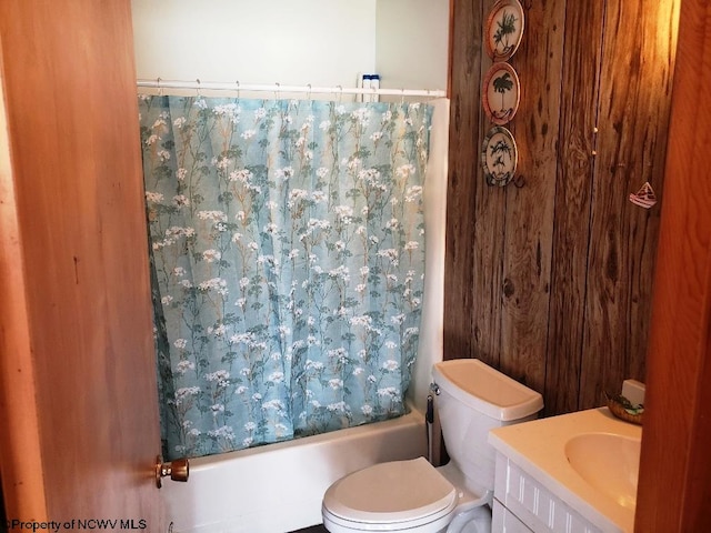 full bathroom with vanity, toilet, and shower / bathtub combination with curtain