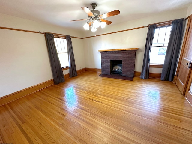 unfurnished living room with light hardwood / wood-style floors and ceiling fan