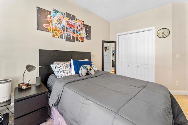 carpeted bedroom featuring a closet