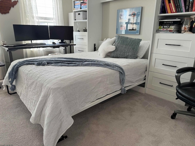 bedroom featuring light colored carpet