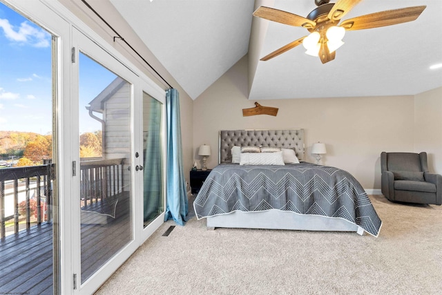 carpeted bedroom featuring visible vents, access to outside, ceiling fan, and vaulted ceiling