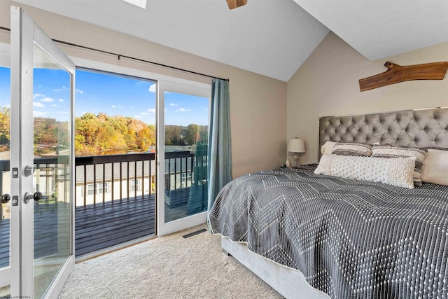 bedroom with lofted ceiling, visible vents, access to outside, and carpet floors