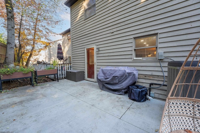 view of patio / terrace featuring cooling unit and grilling area