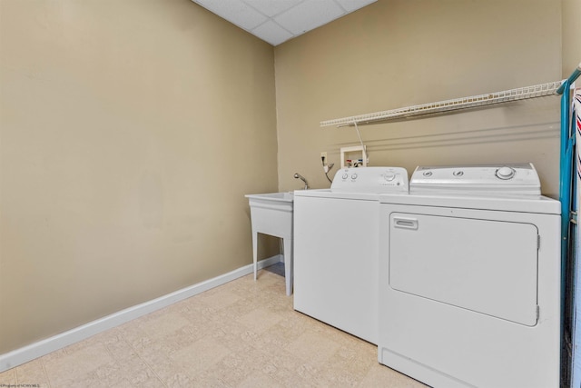 washroom with washer and clothes dryer