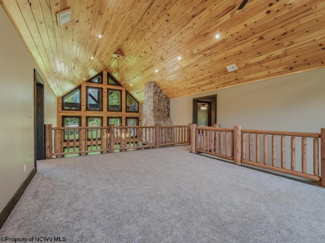 bonus room featuring wood ceiling, carpet flooring, and vaulted ceiling