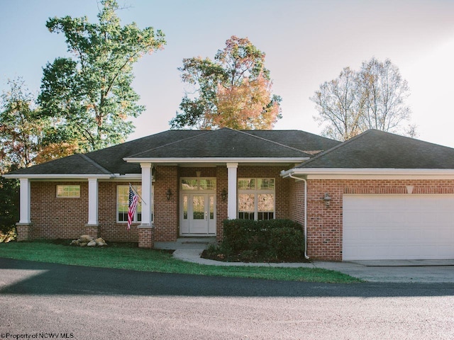 ranch-style house featuring a garage