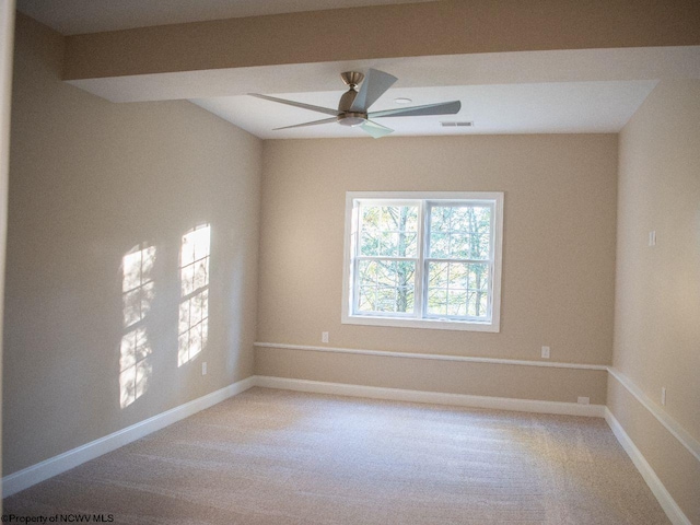 unfurnished room featuring carpet floors and ceiling fan