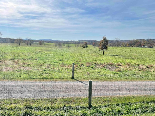 exterior space with a rural view