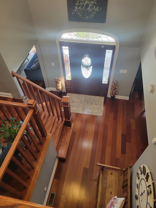 entrance foyer featuring hardwood / wood-style floors