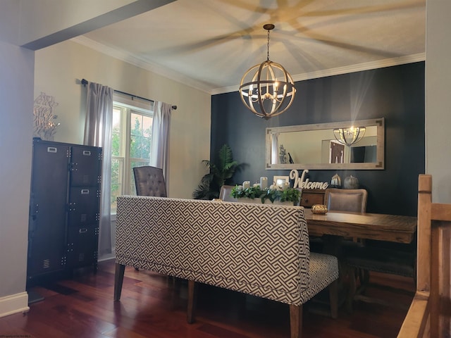 dining space with hardwood / wood-style flooring, ornamental molding, and a chandelier