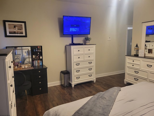 bedroom featuring dark wood-type flooring