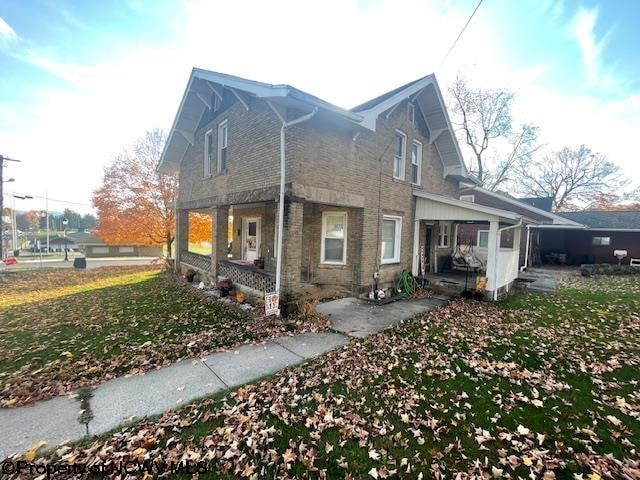 view of home's exterior featuring a porch