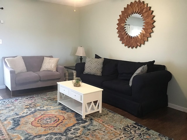 living room with dark wood-type flooring