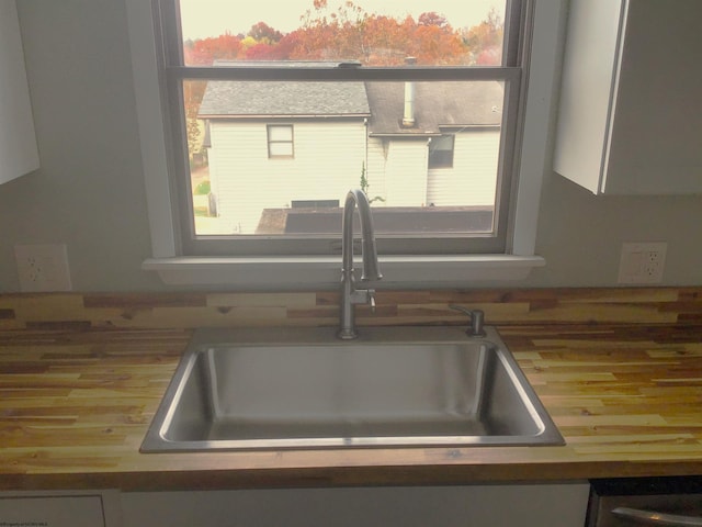 room details featuring sink and butcher block countertops