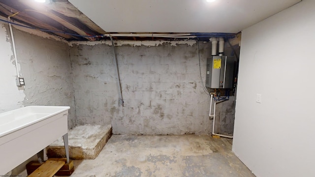 basement with sink and water heater