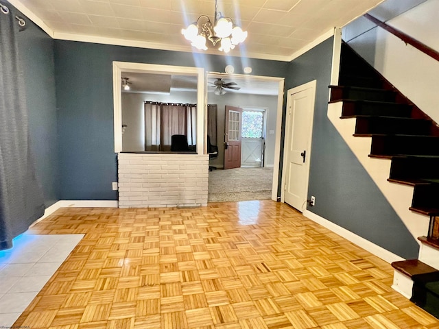 interior space featuring ceiling fan with notable chandelier, crown molding, and light parquet floors